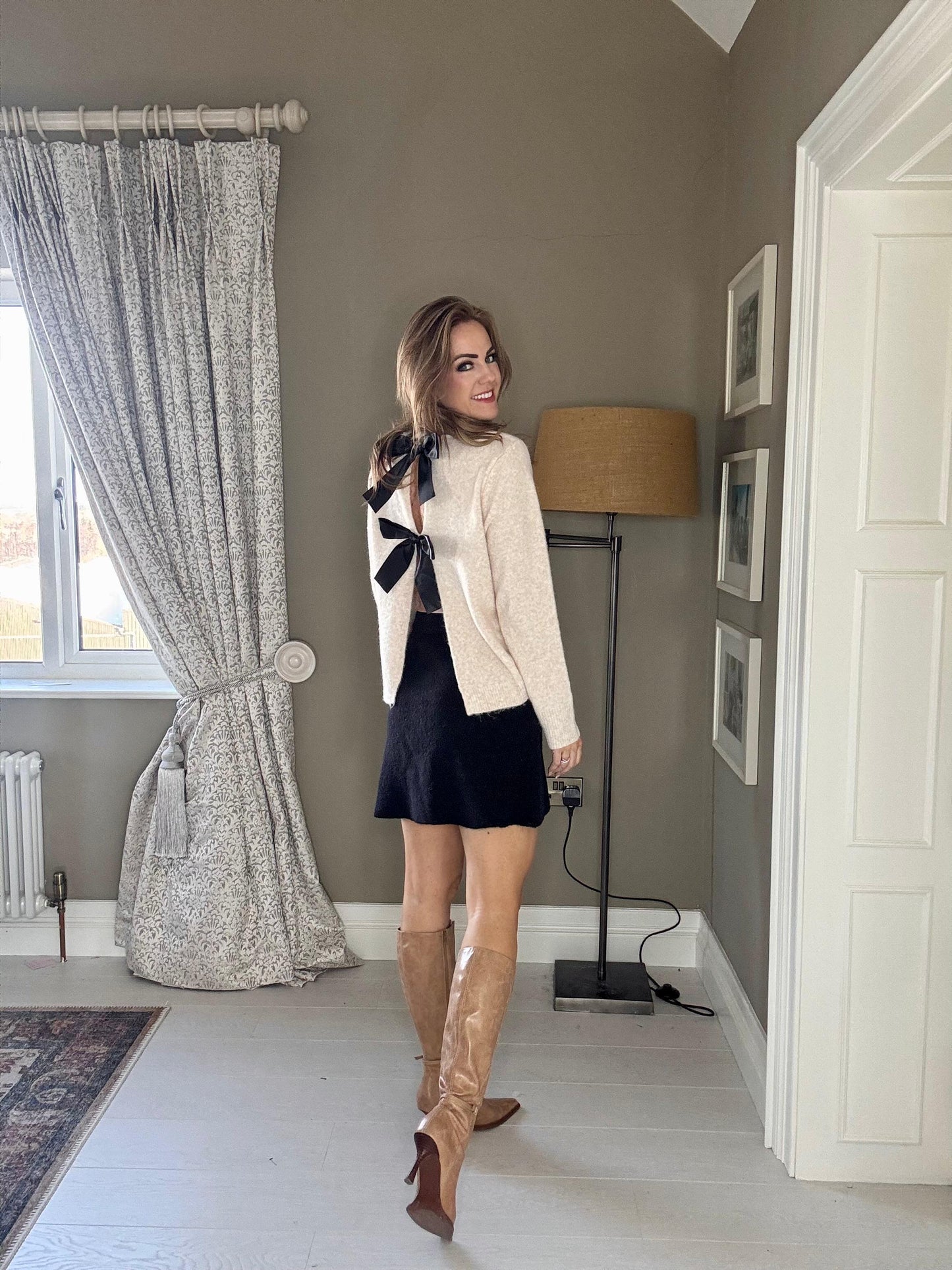 Amelia ivory jumper with reverse black bow