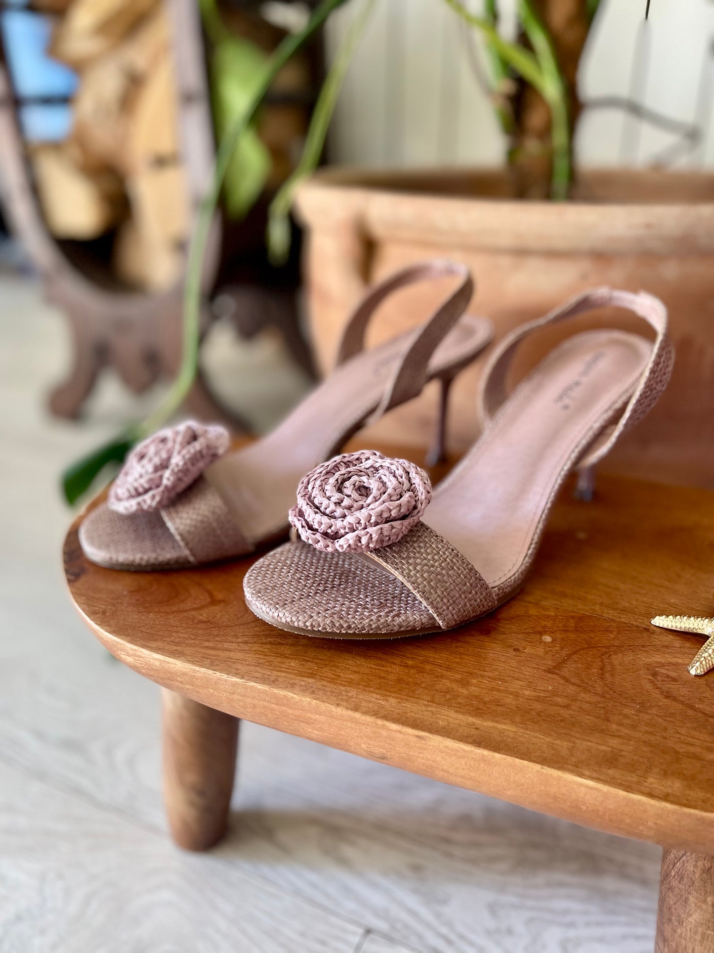 Braided pink stiletto sandal with decorative rose