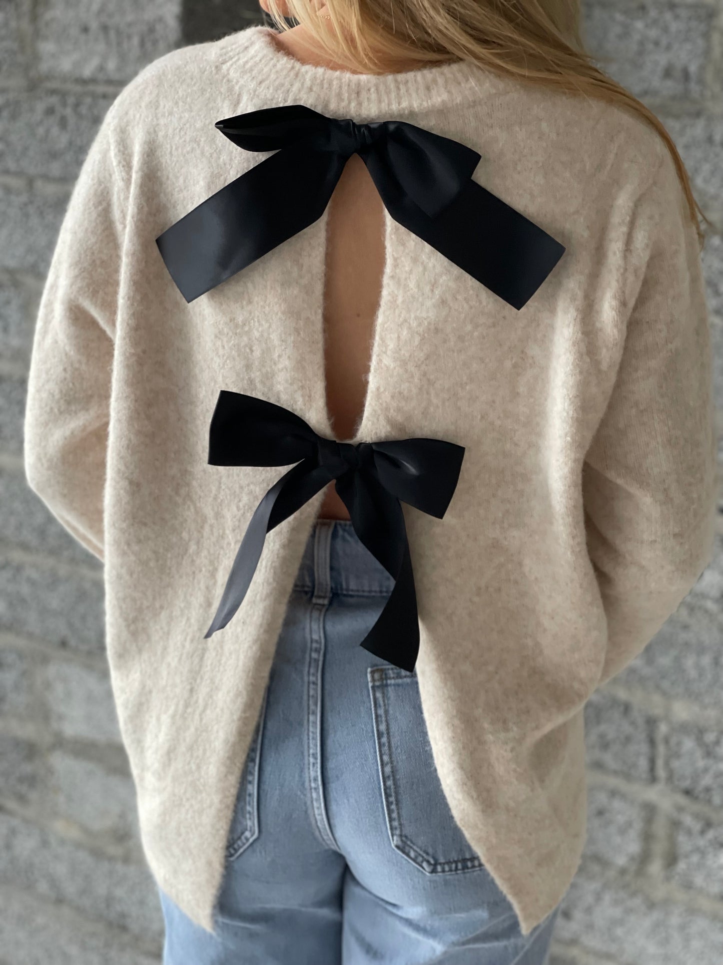 Amelia ivory jumper with reverse black bow