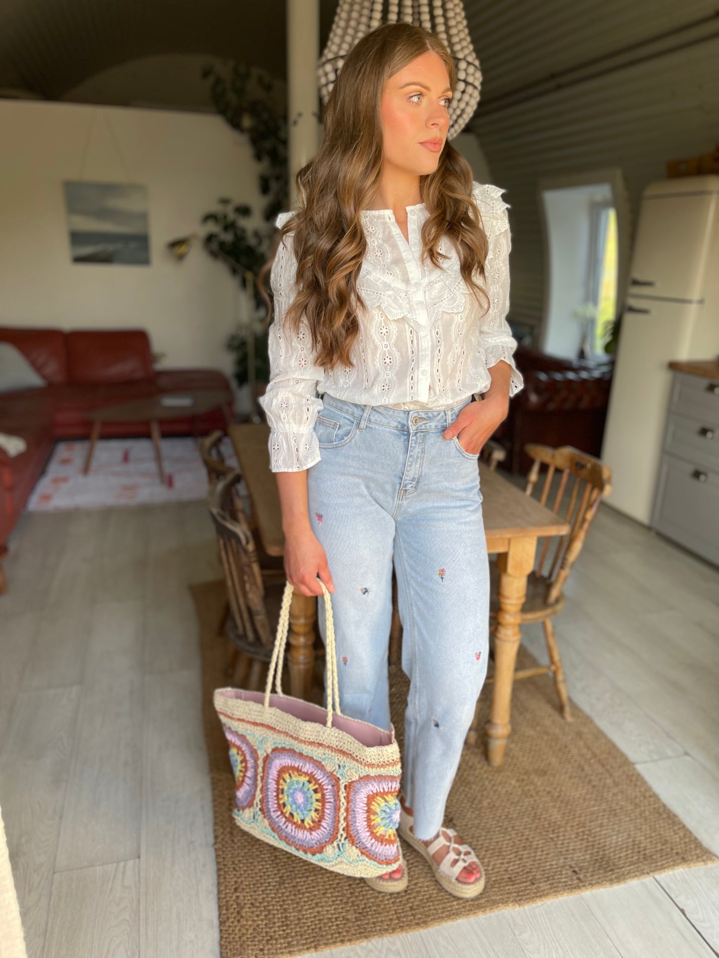 Floral embroidered light wash wide/straight leg jeans