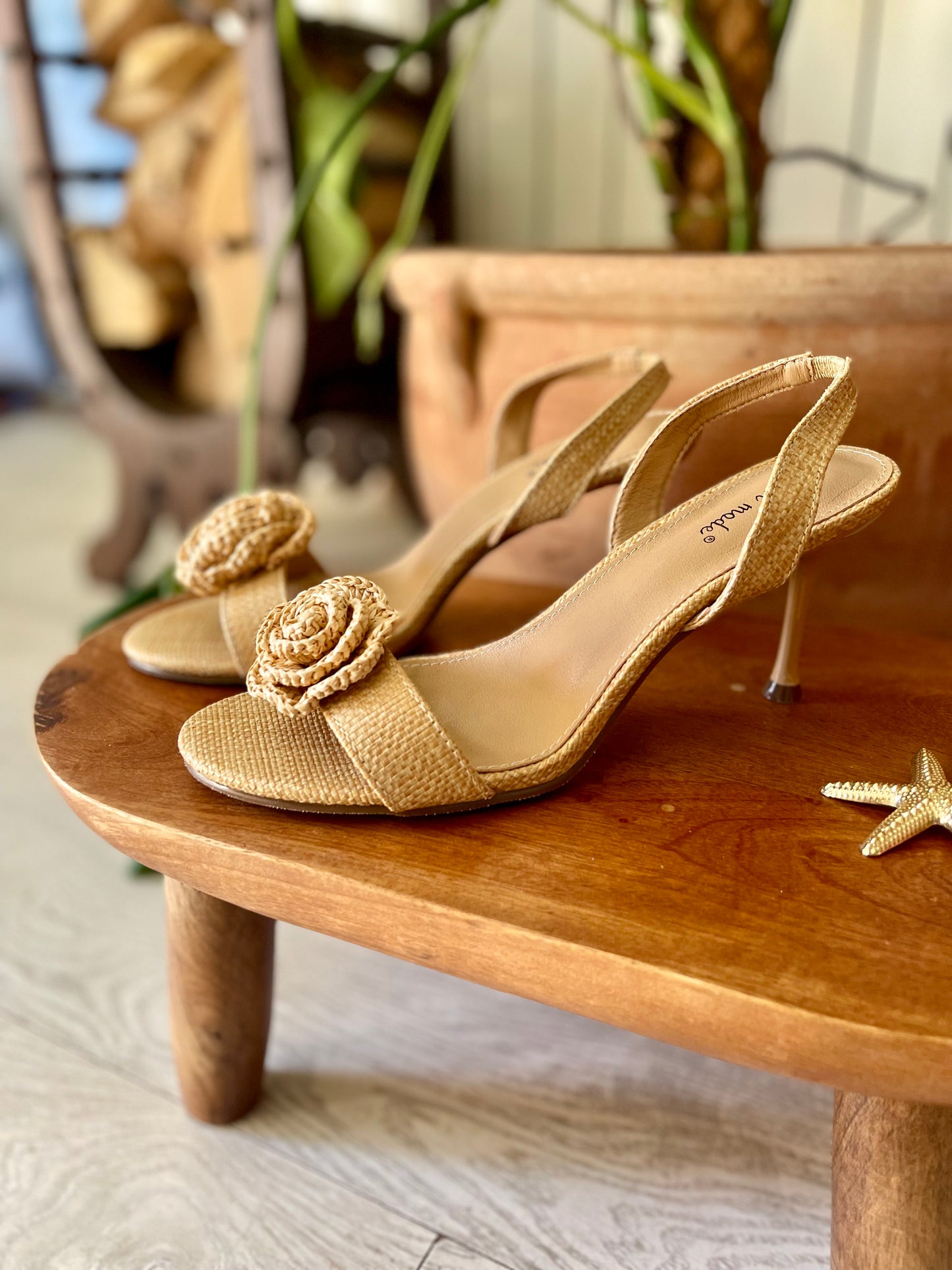 Braided beige stiletto sandal with decorative rose