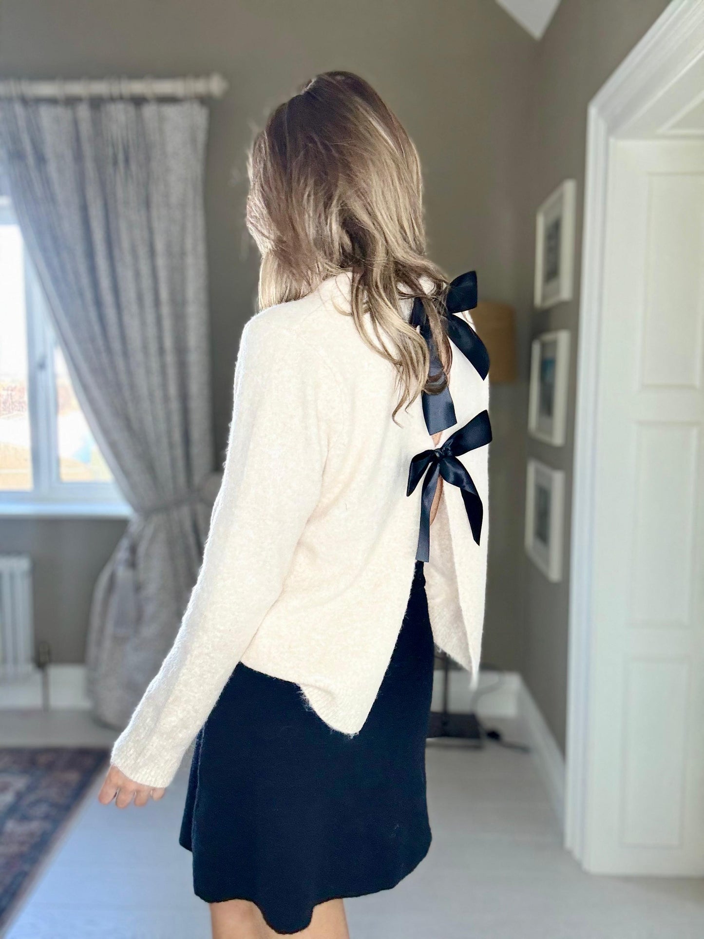 Amelia ivory jumper with reverse black bow