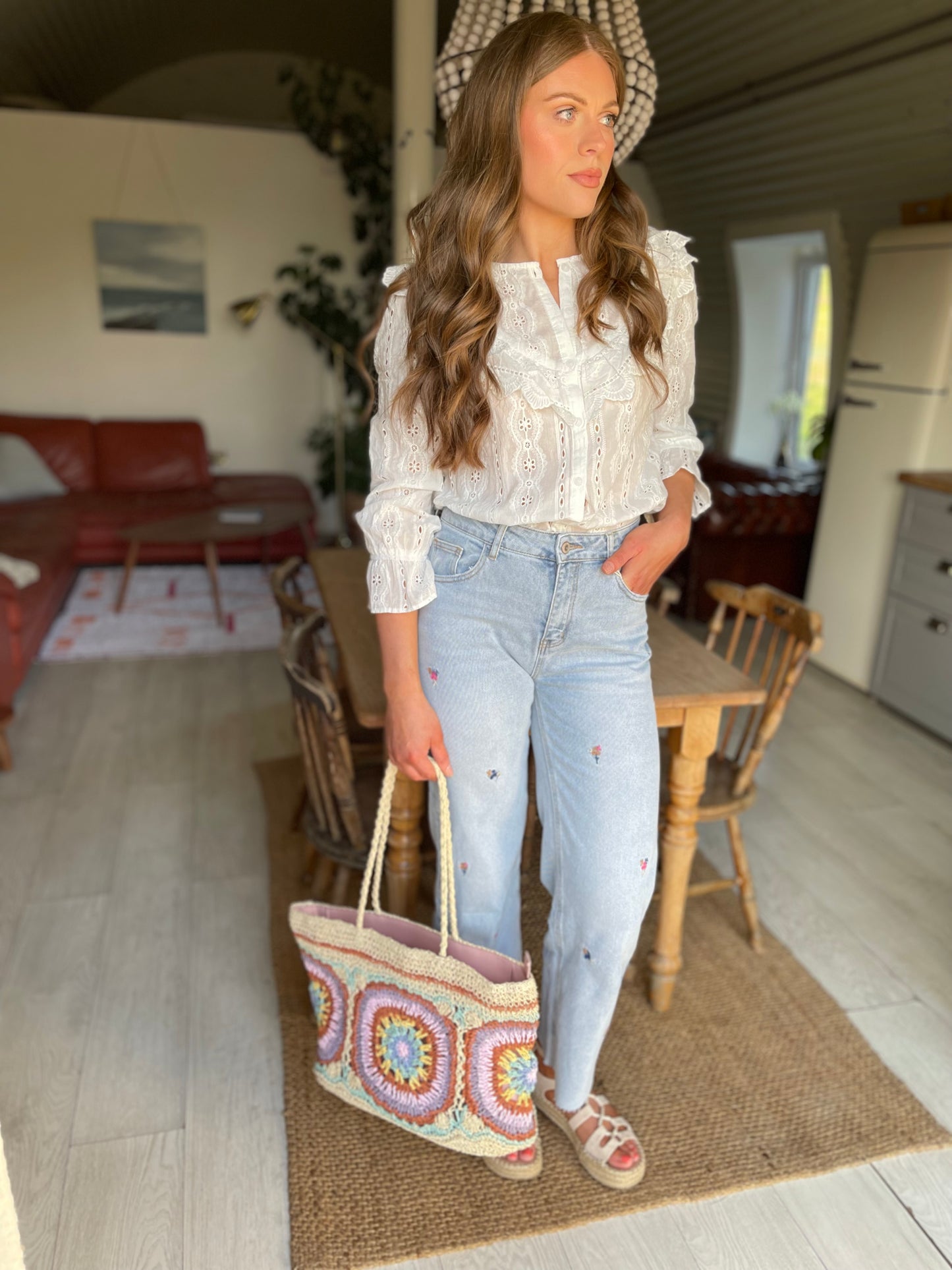 Floral embroidered light wash wide/straight leg jeans