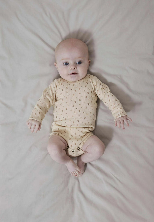 LIL' ATELIER floral beige LONG SLEEVED ROMPER