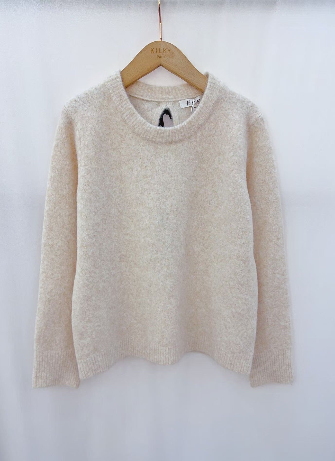 Amelia ivory jumper with reverse black bow