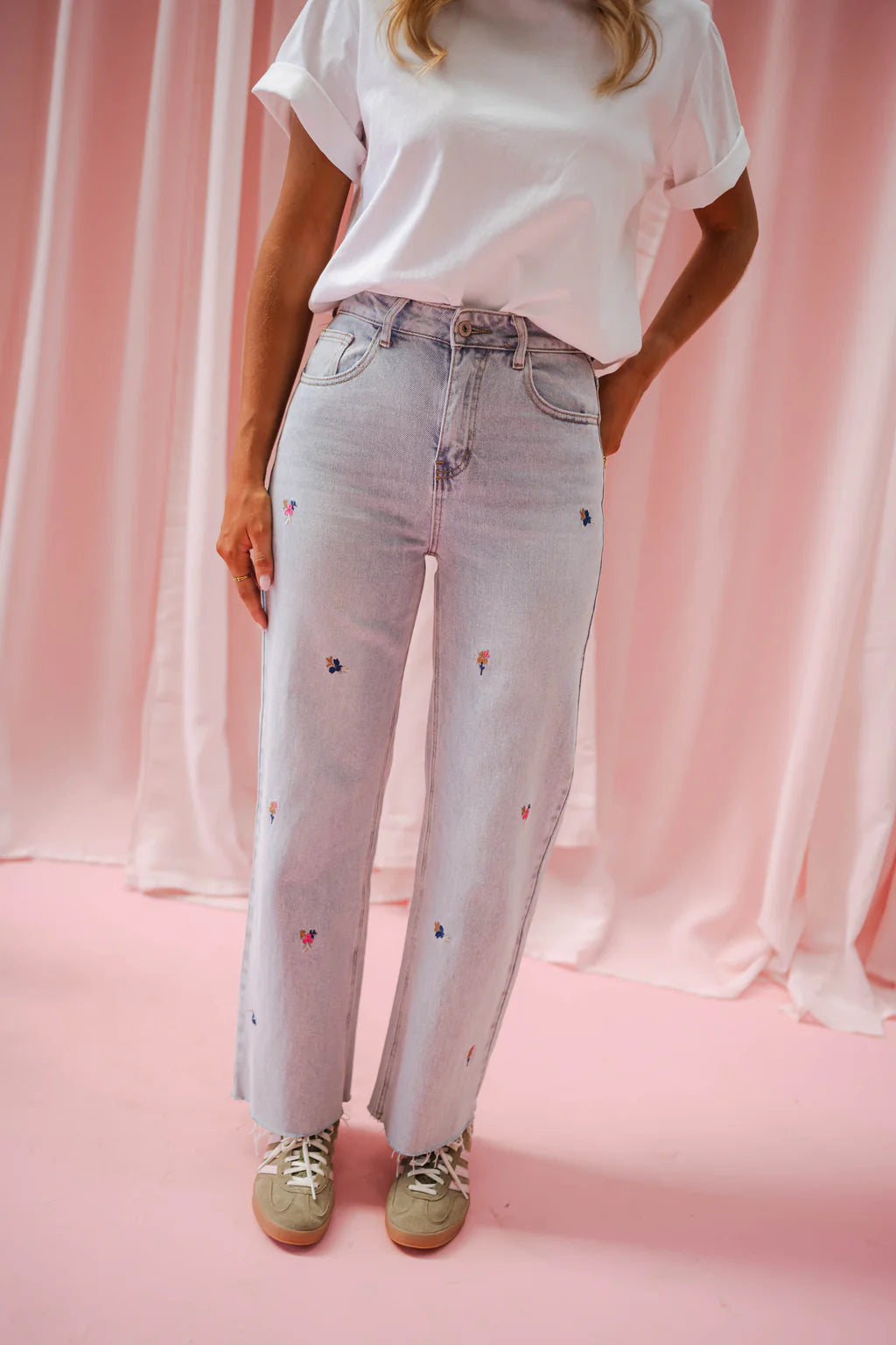 Floral embroidered light wash wide/straight leg jeans