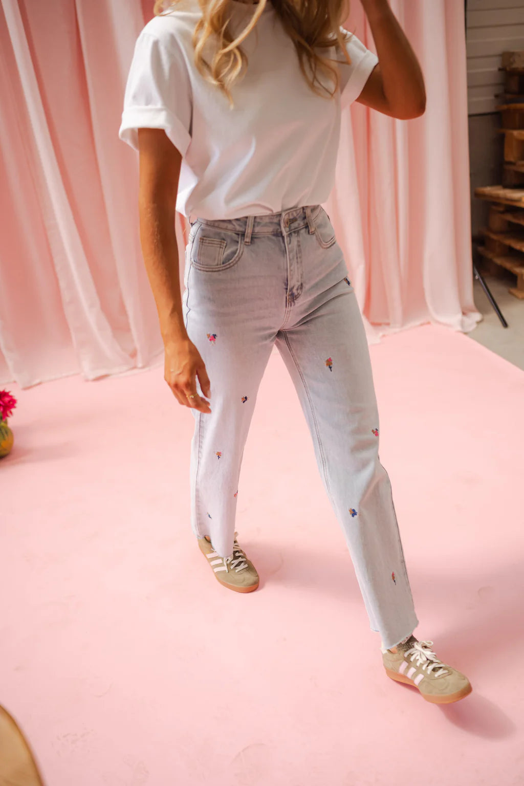 Floral embroidered light wash wide/straight leg jeans