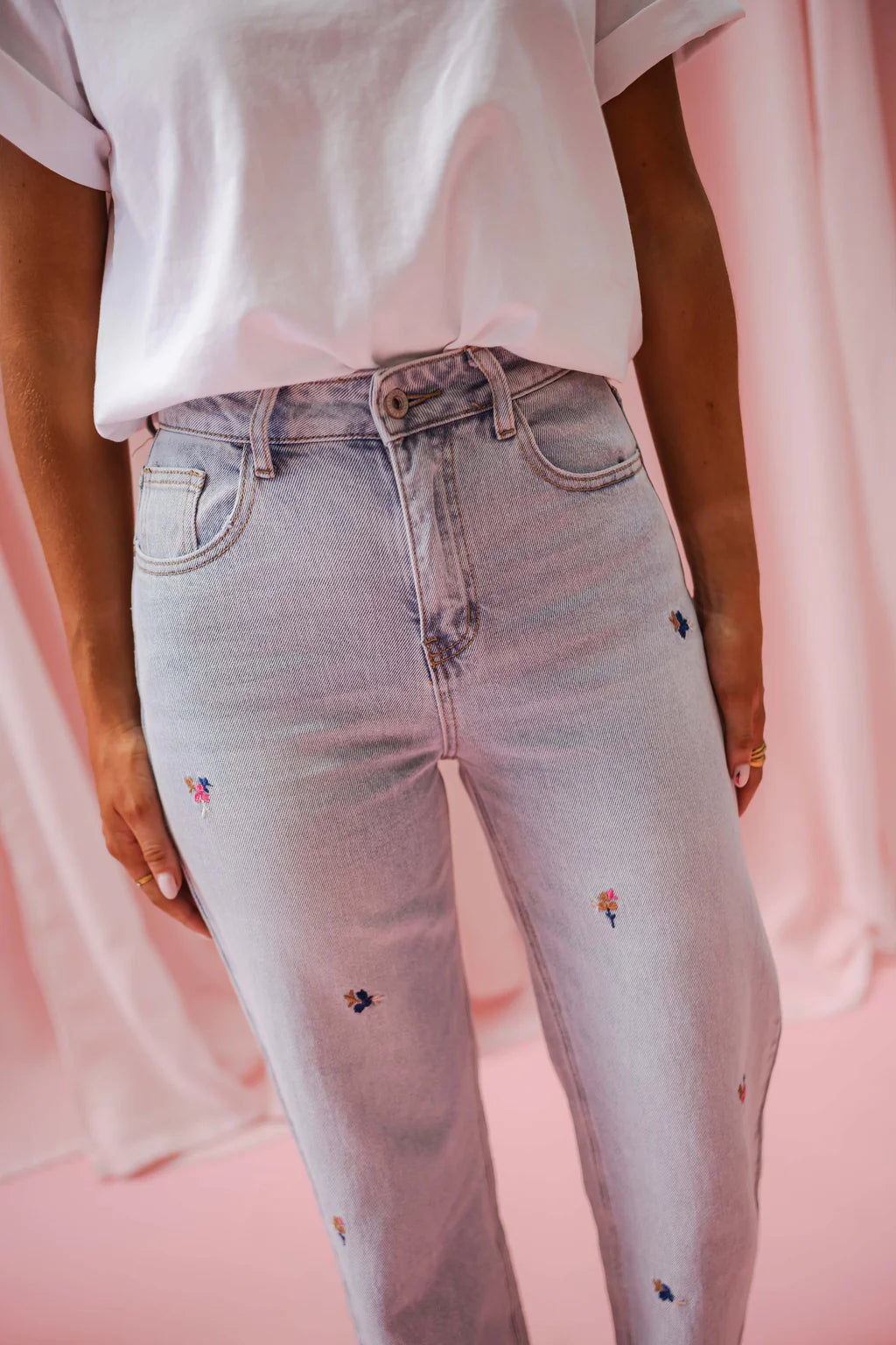 Floral embroidered light wash wide/straight leg jeans
