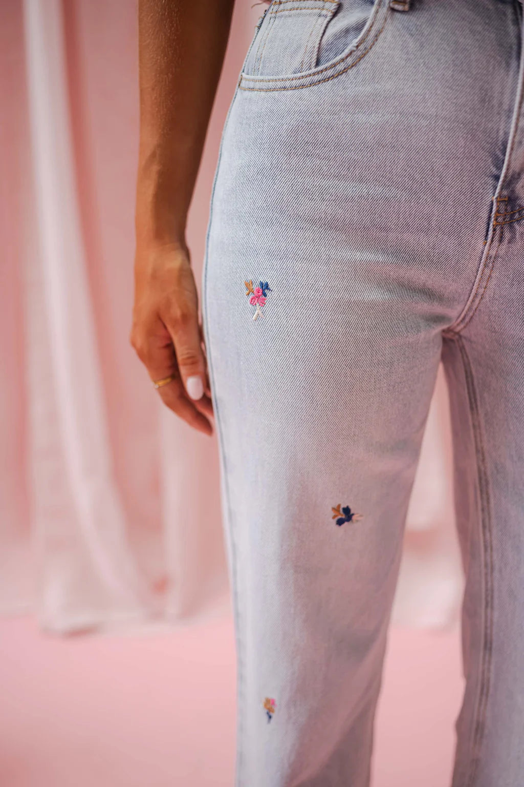 Floral embroidered light wash wide/straight leg jeans