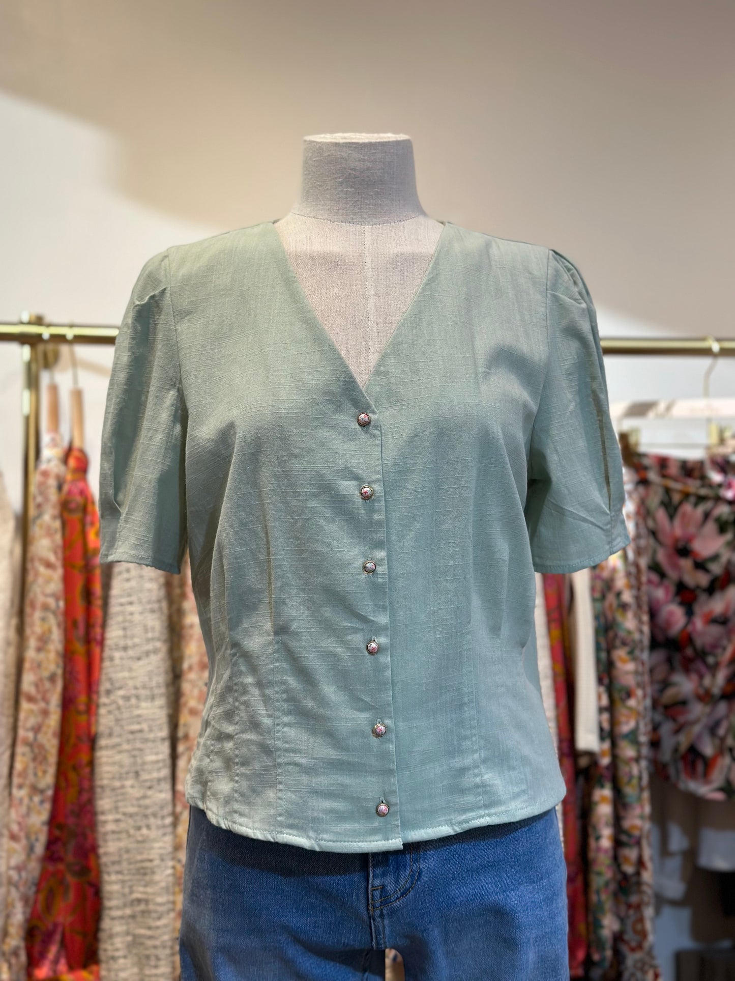 Meredith sage green cotton blouse with decorative buttons