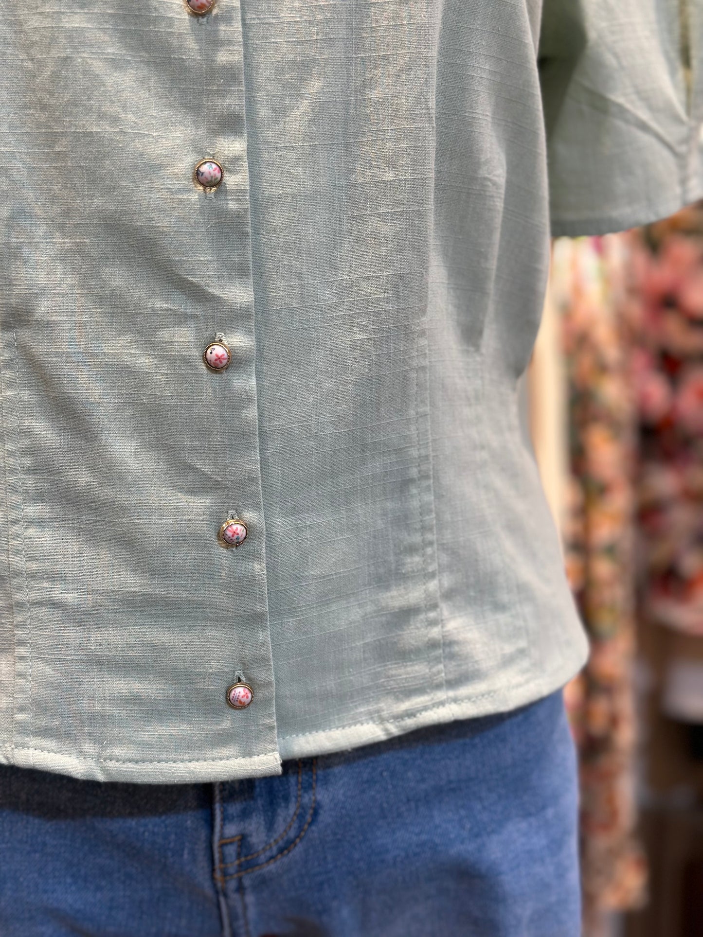 Meredith sage green cotton blouse with decorative buttons
