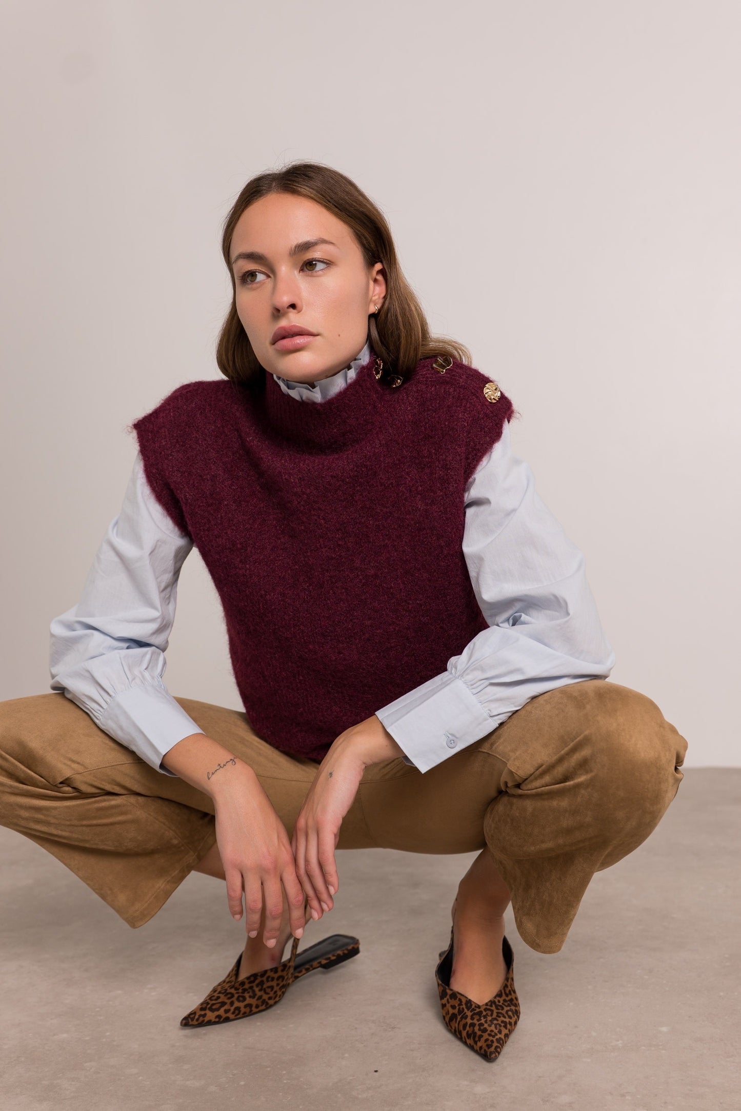 Sophia burgundy sleeveless jumper with gold buttons