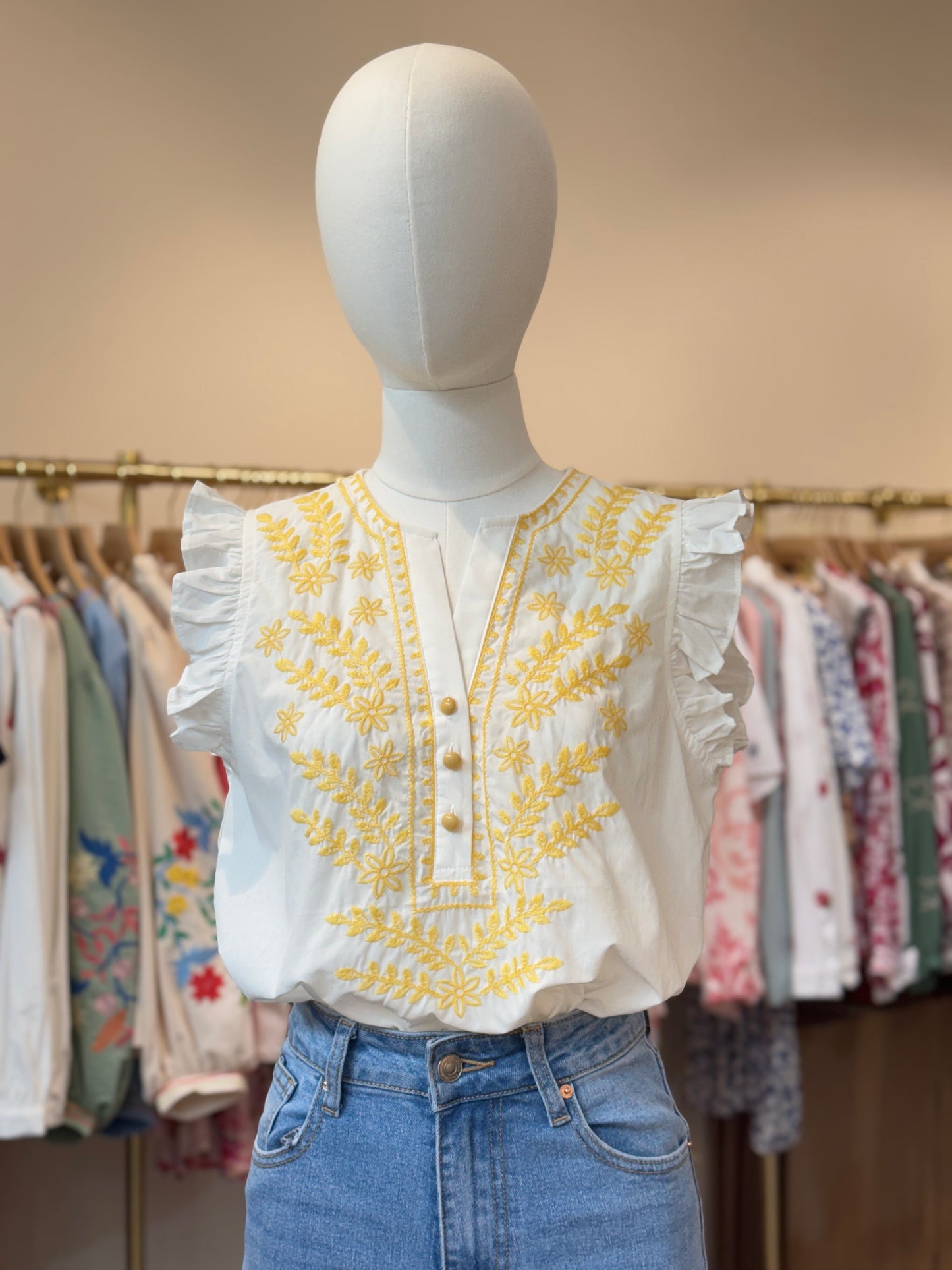 Ada yellow frill sleeveless blouse