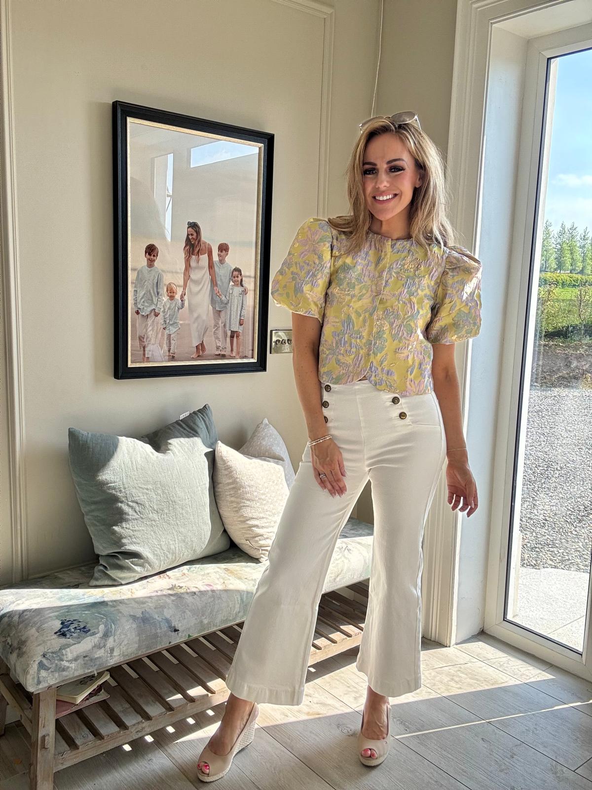 Wide leg white jeans with gold buttons