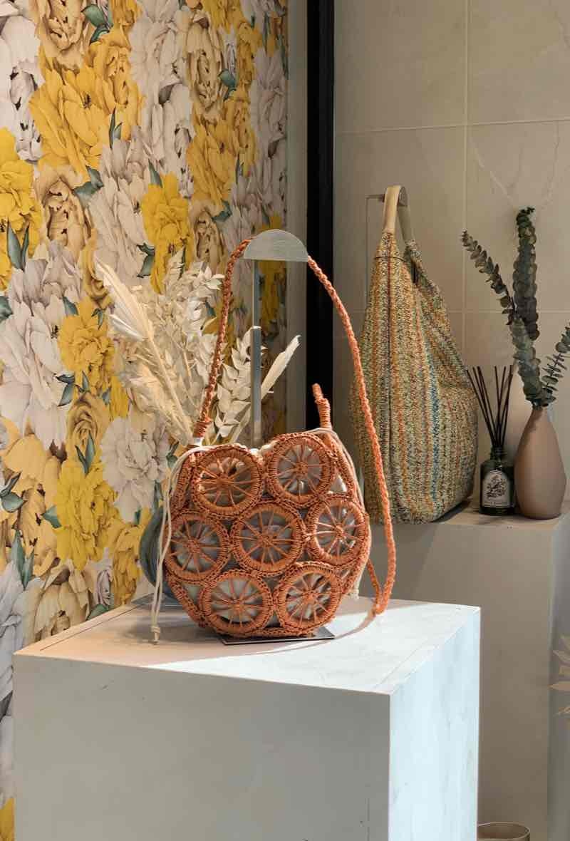 Orange rattan mini bag with strap