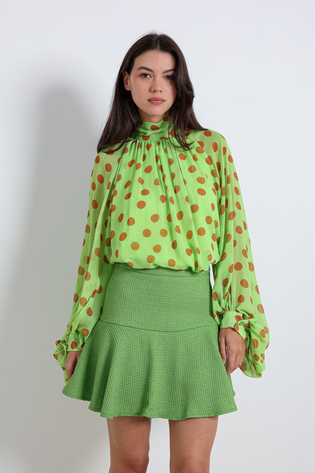 Green polka dot balloon sleeve top