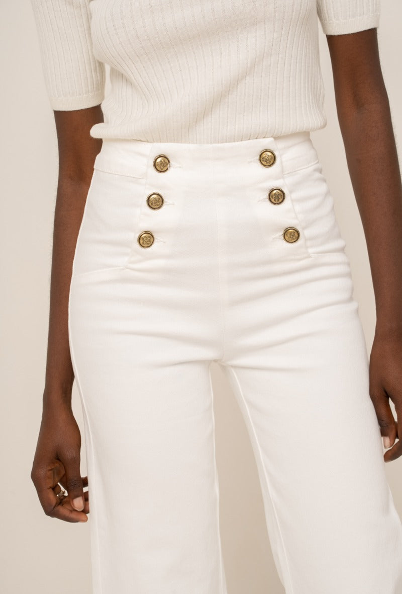 Wide leg white jeans with gold buttons