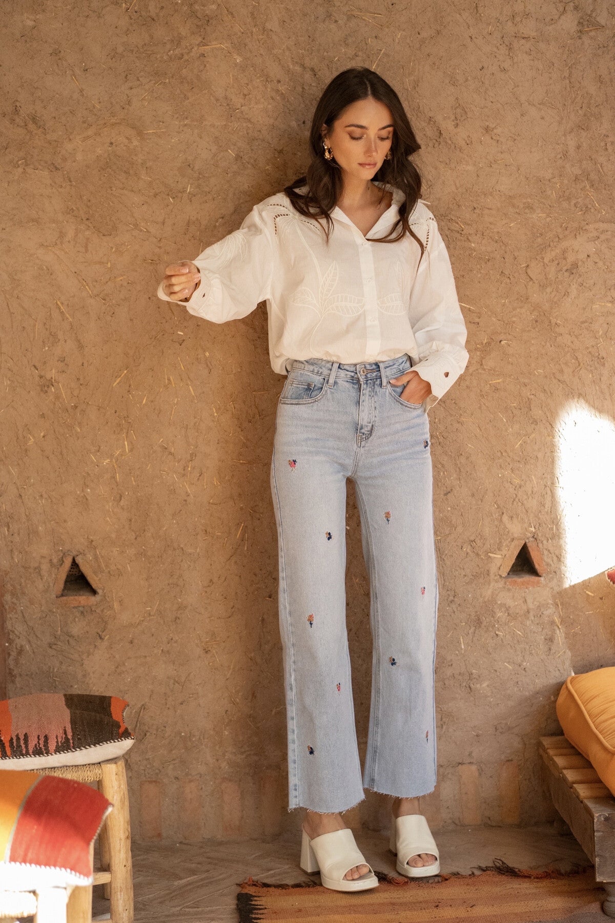 Floral embroidered light wash wide/straight leg jeans