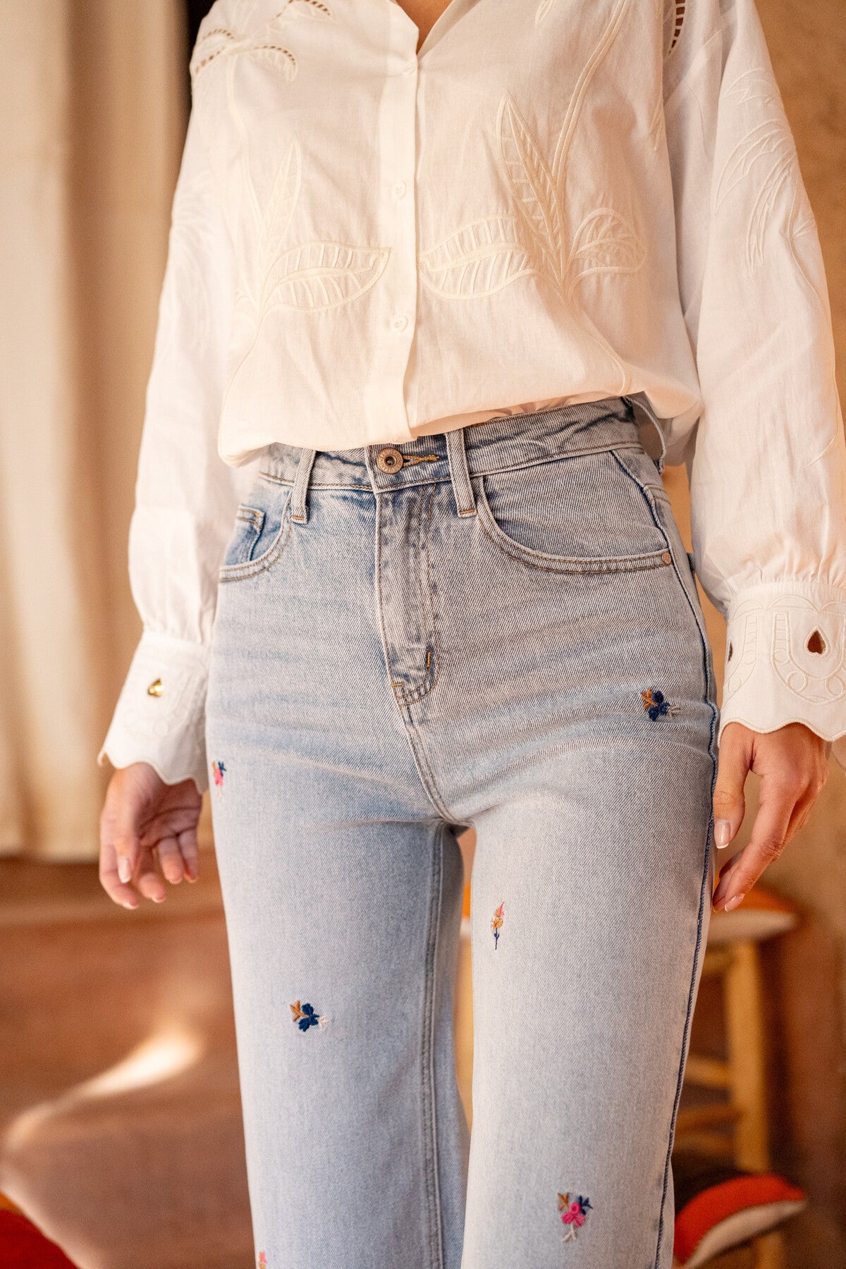 Floral embroidered light wash wide/straight leg jeans
