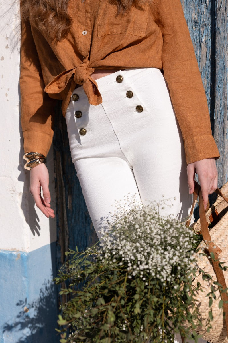 Wide leg white jeans with gold buttons
