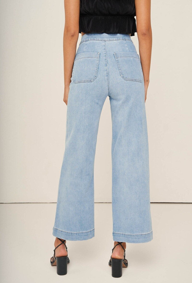 Light blue wide leg jeans with front buttons