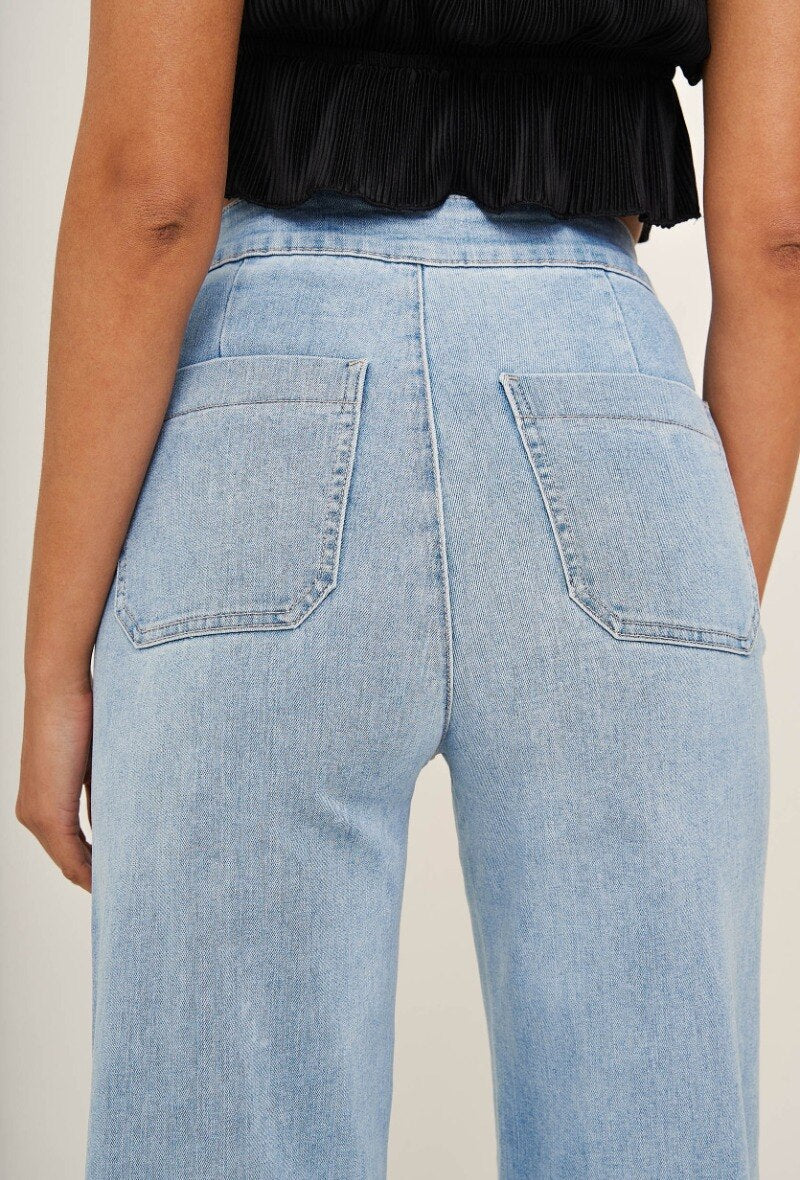 Light blue wide leg jeans with front buttons