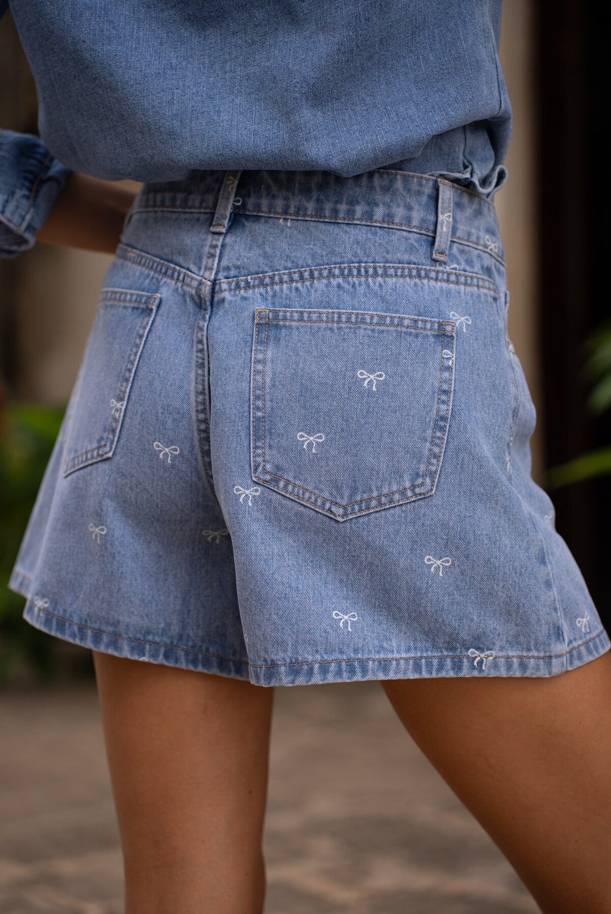Bow detail blue wash denim shorts