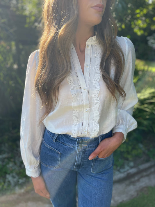 Pearl button scalloped blouse