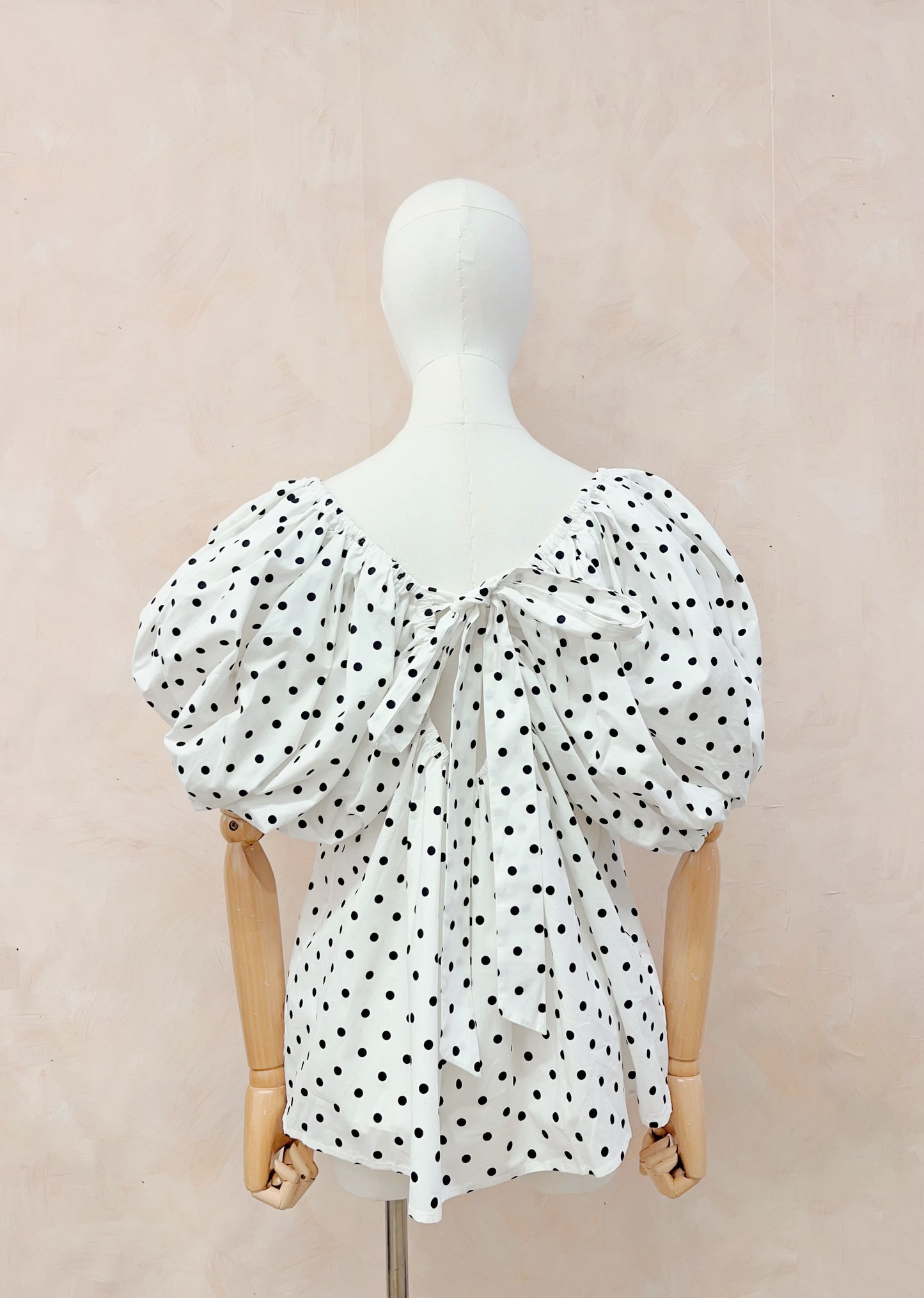 Kayla white polka dot bow back top