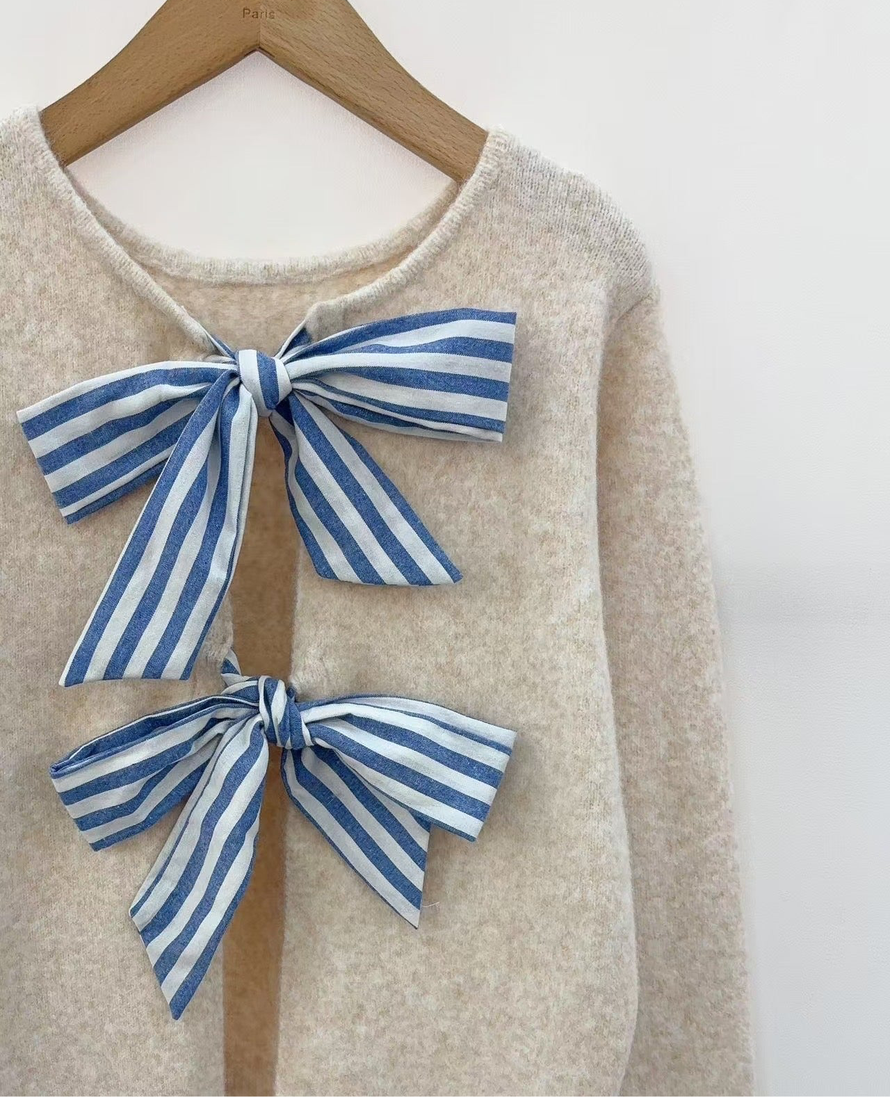 Erin beige jumper with striped bow back detail