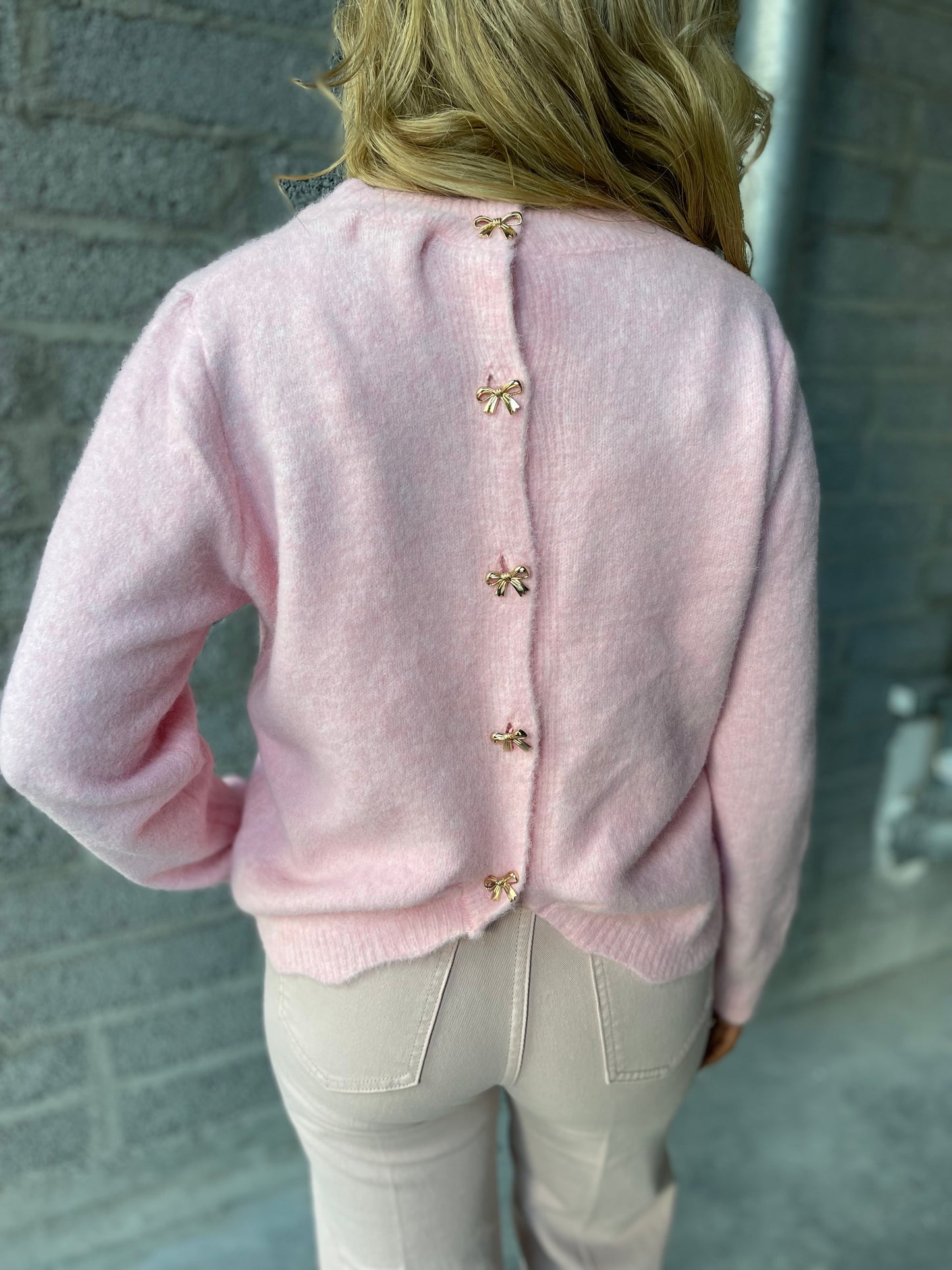 Cassie pink gold bow back detail