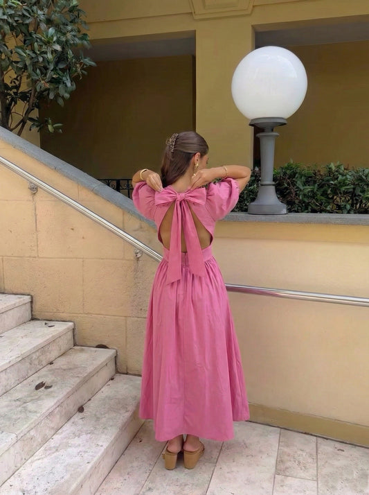 Elodie raspberry pink bow dress