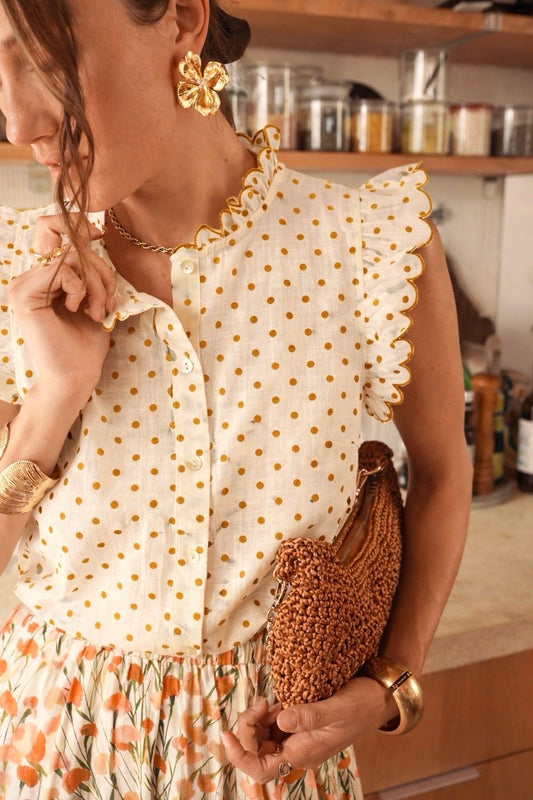 Isabella mustard polka dot sleeveless blouse