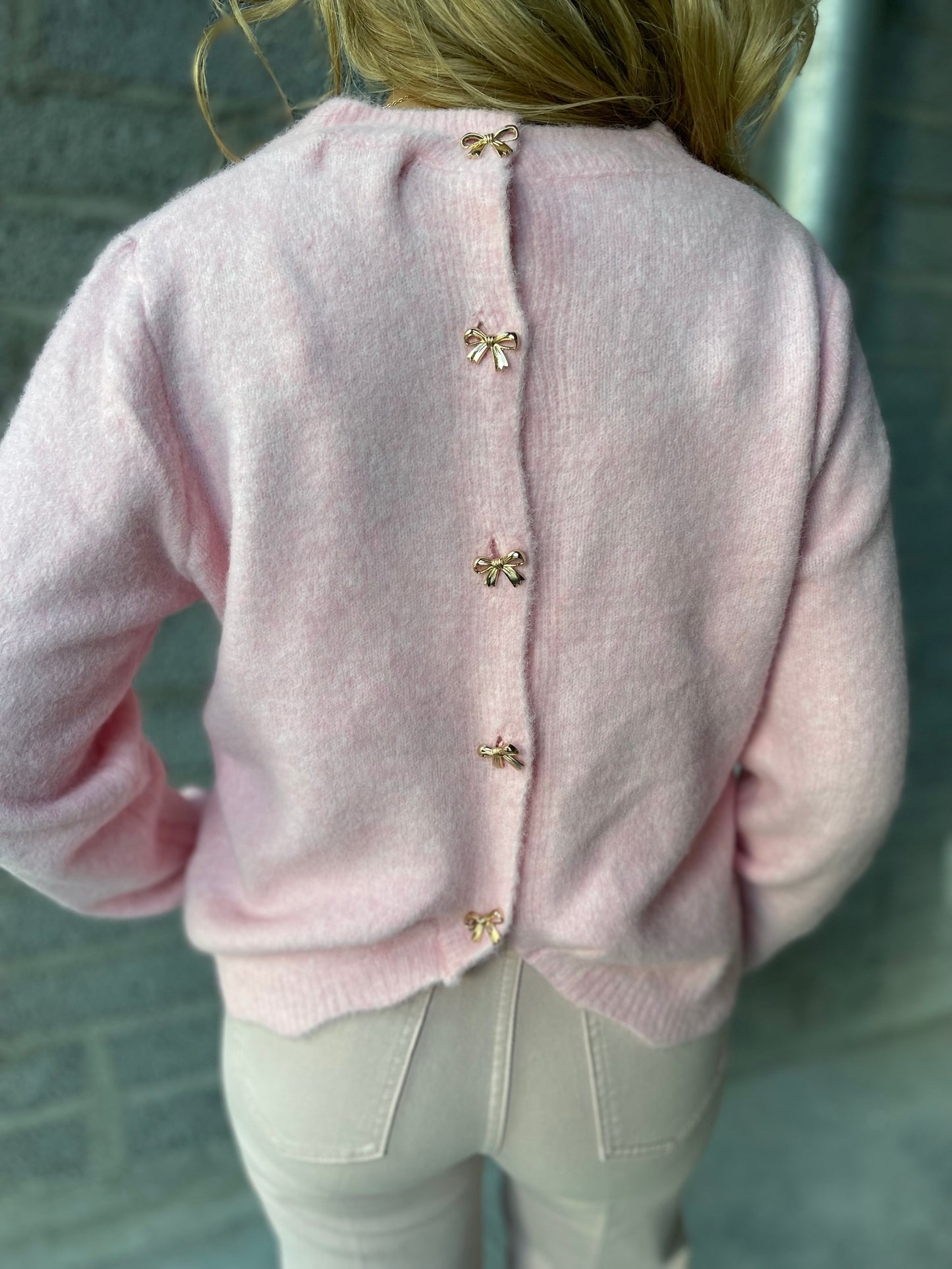 Cassie pink gold bow back detail