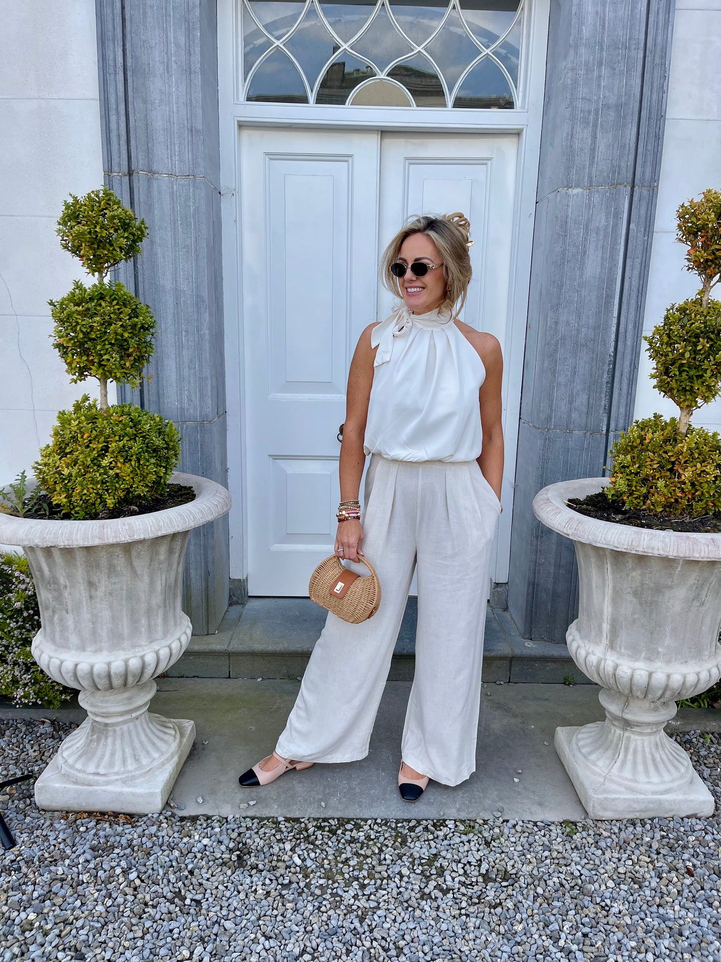 Justine bow neck cream top
