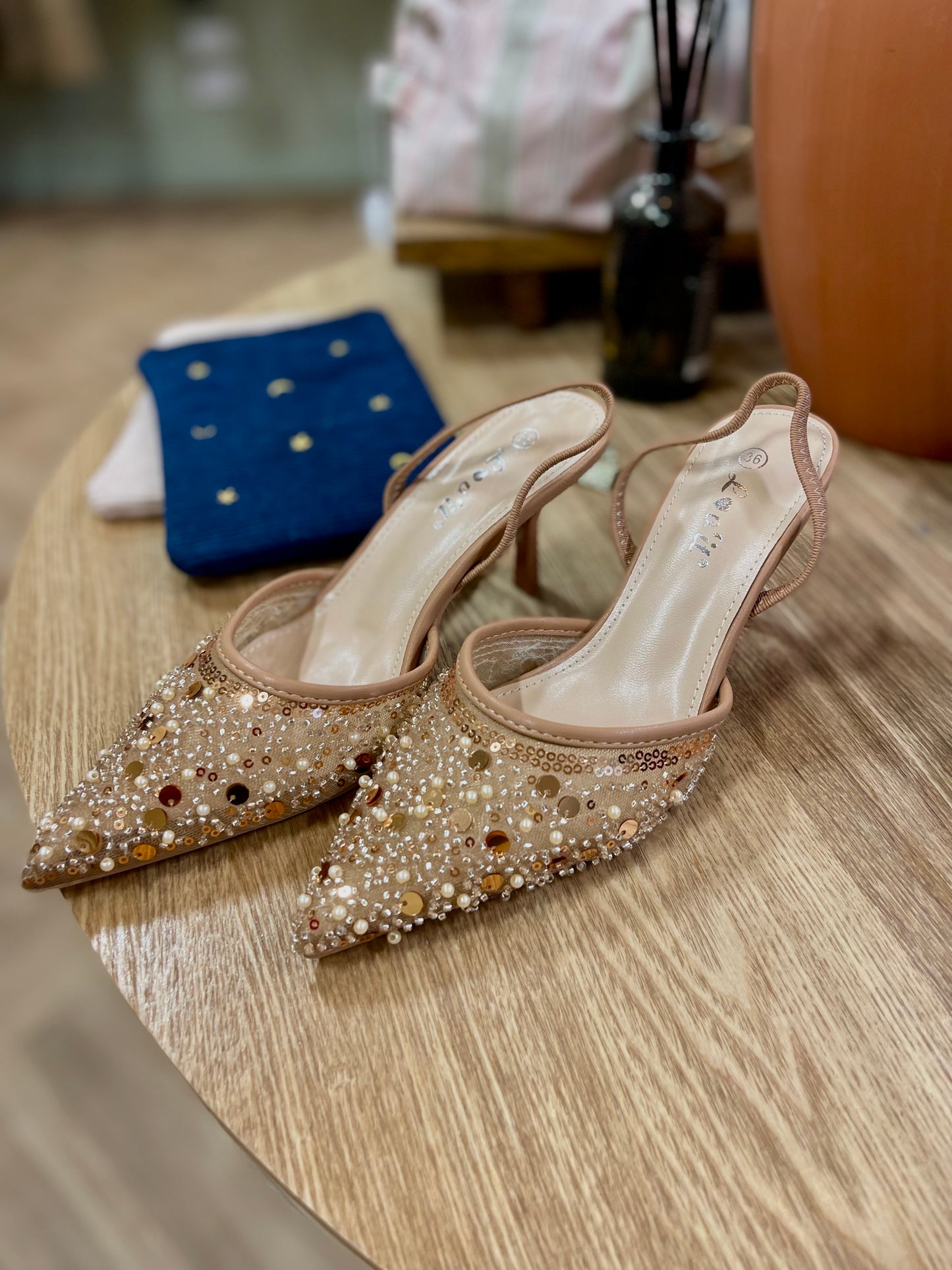 Gold embellished sling back mid heel shoes