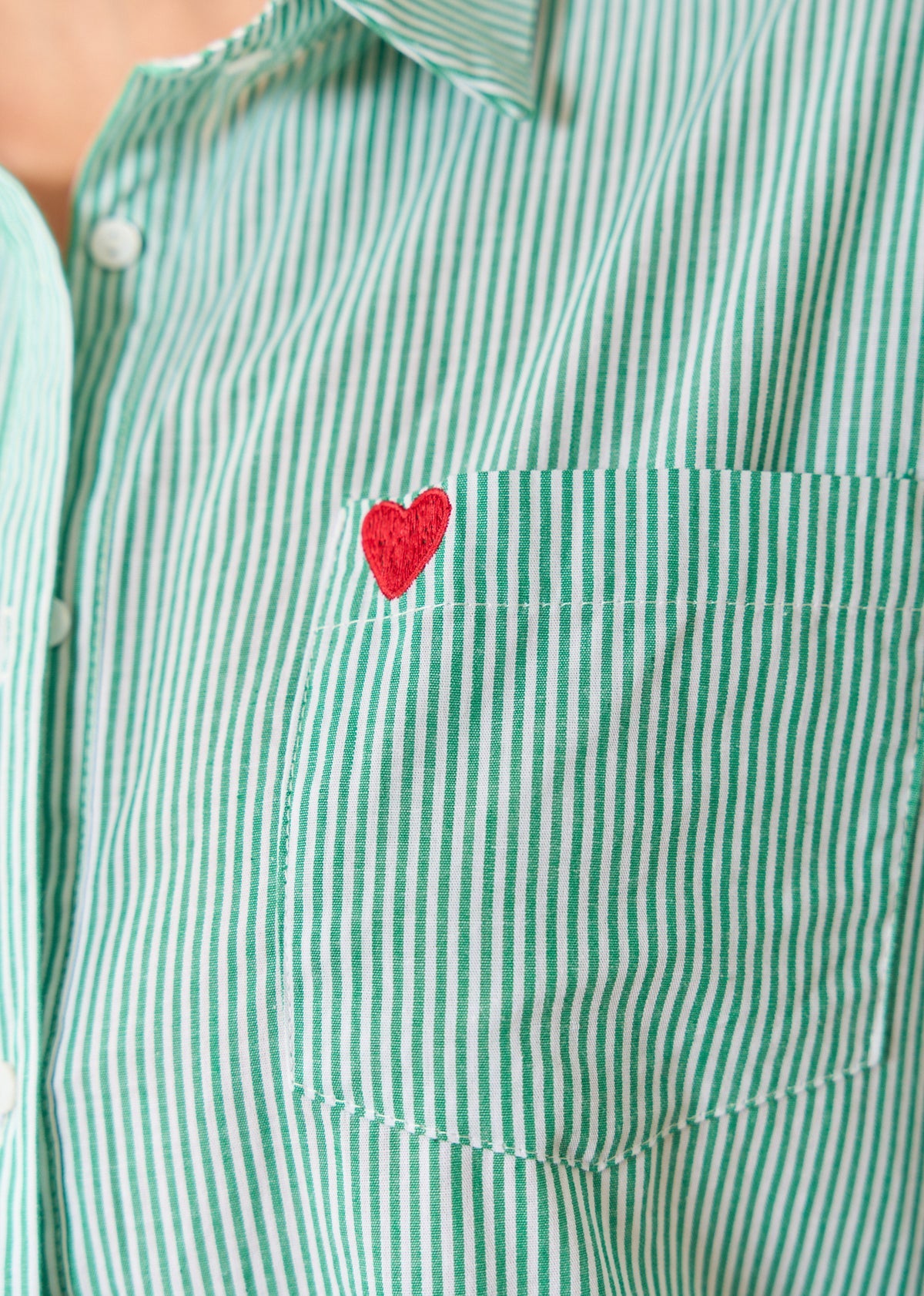 Rhea green striped shirt with heart