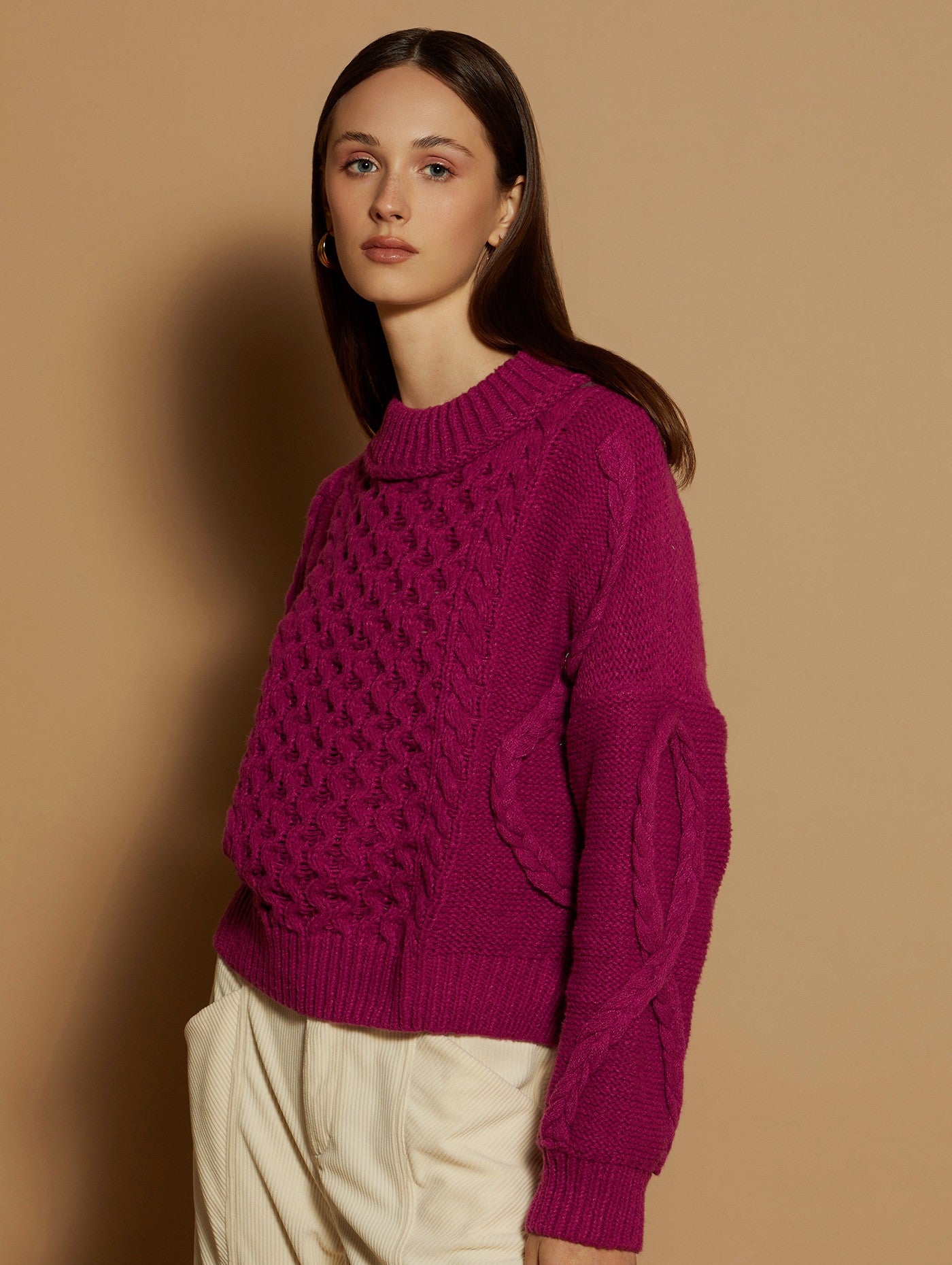 Cable knit braided pink jumper