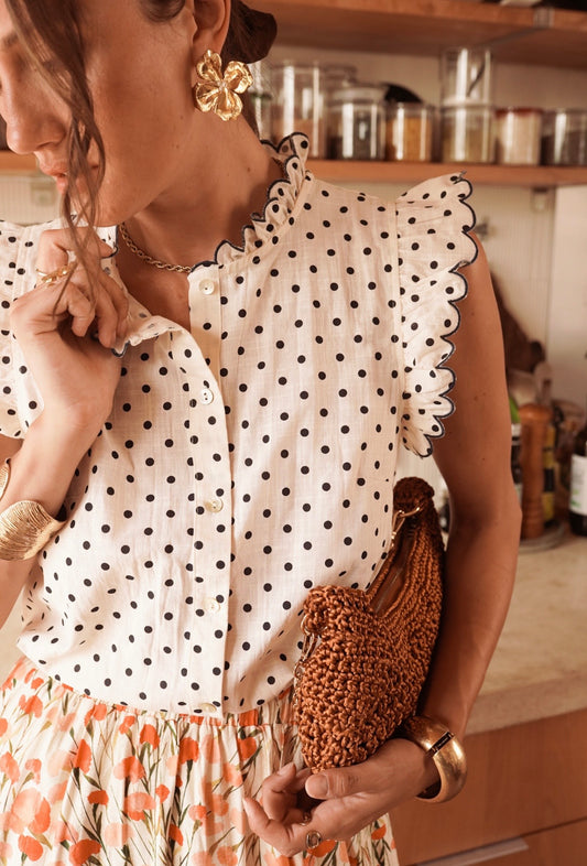 Isabella navy polka dot sleeveless blouse