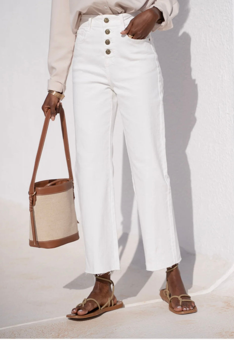 Straight white jeans with front buttons