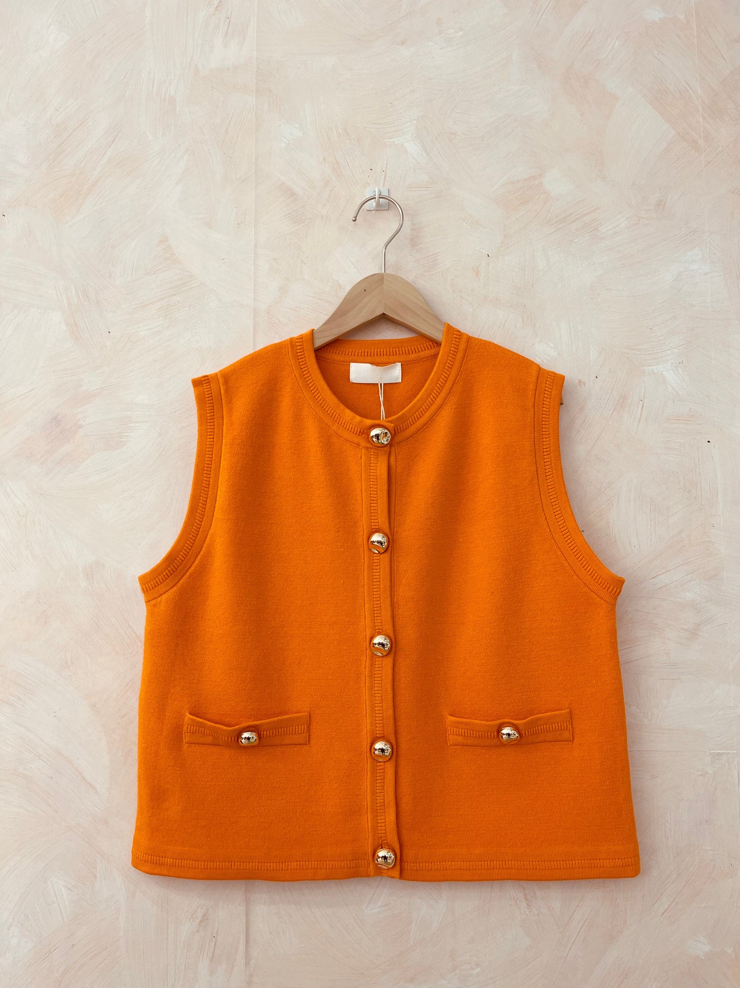 Marie orange gilet with gold buttons