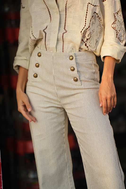 Taupe stripe wide leg jeans with front gold buttons