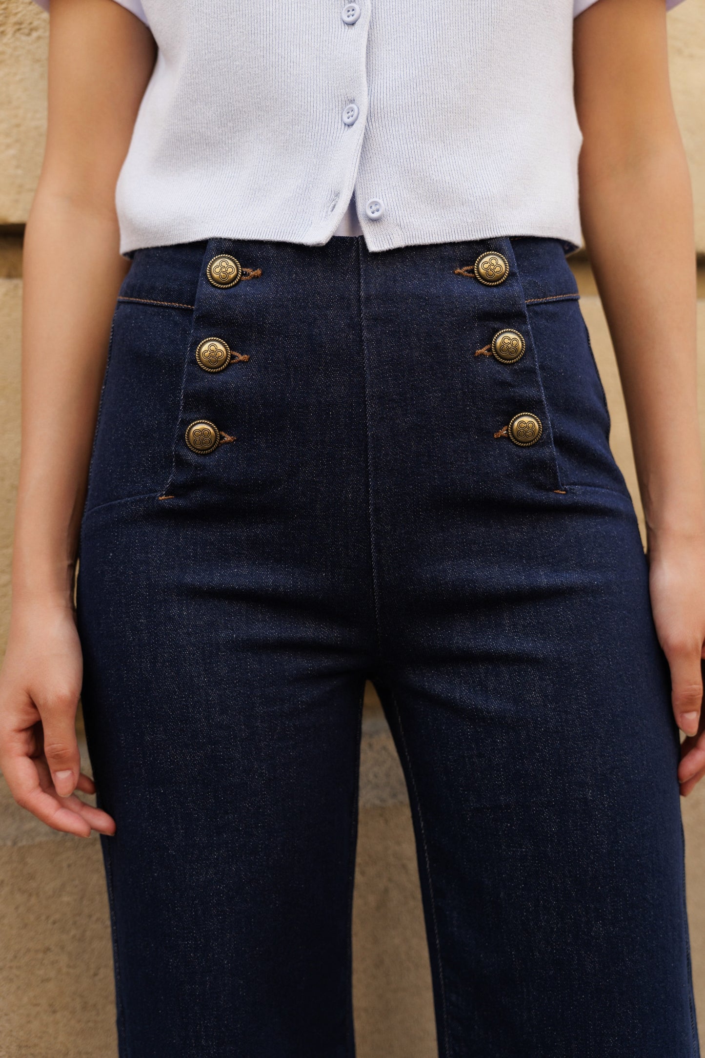 Navy blue wide leg jeans with front gold buttons