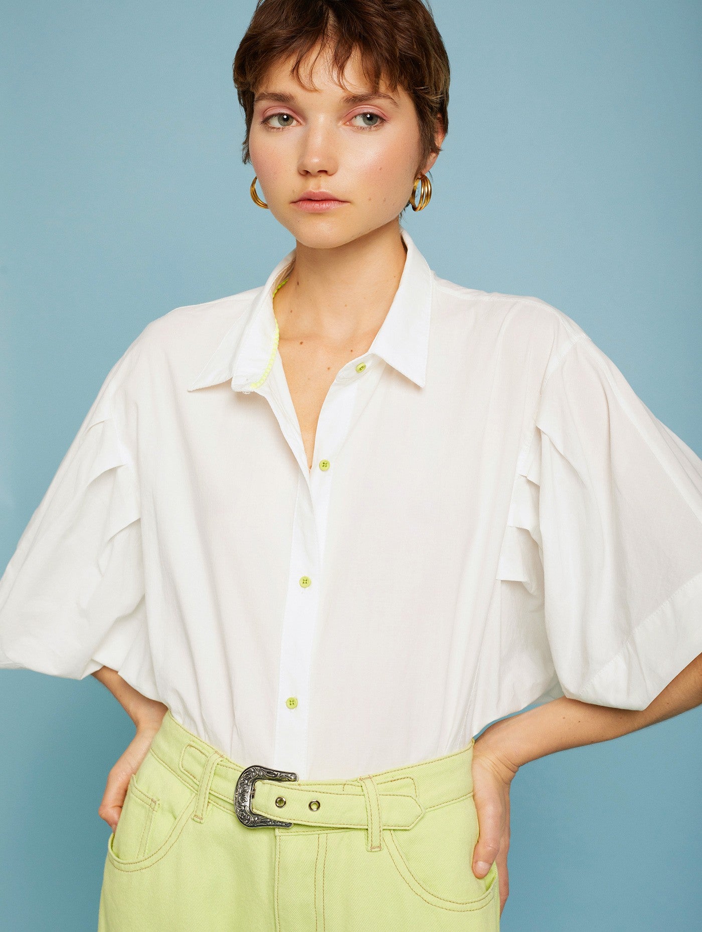 Pleated sleeve blouse with neon buttons