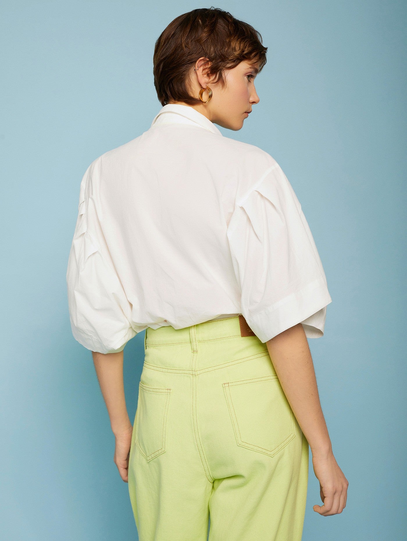 Pleated sleeve blouse with neon buttons