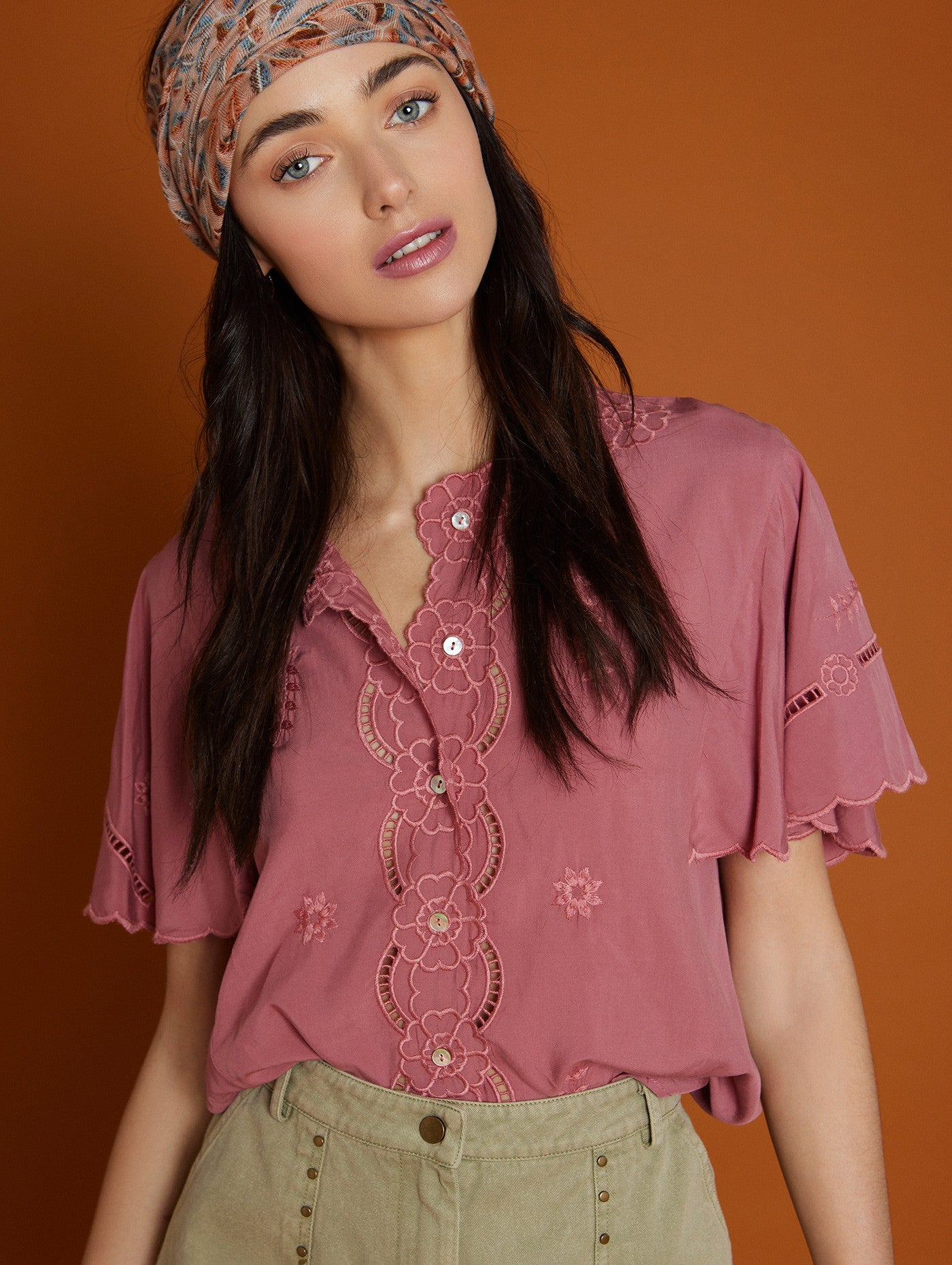 Embroidered cut out pink blouse