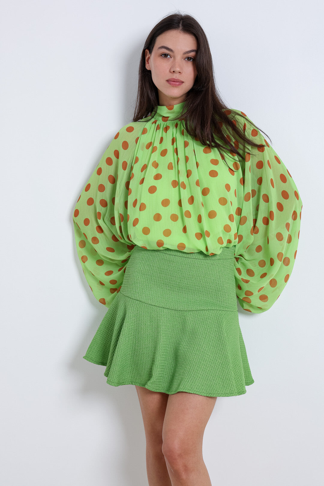 Green polka dot balloon sleeve top
