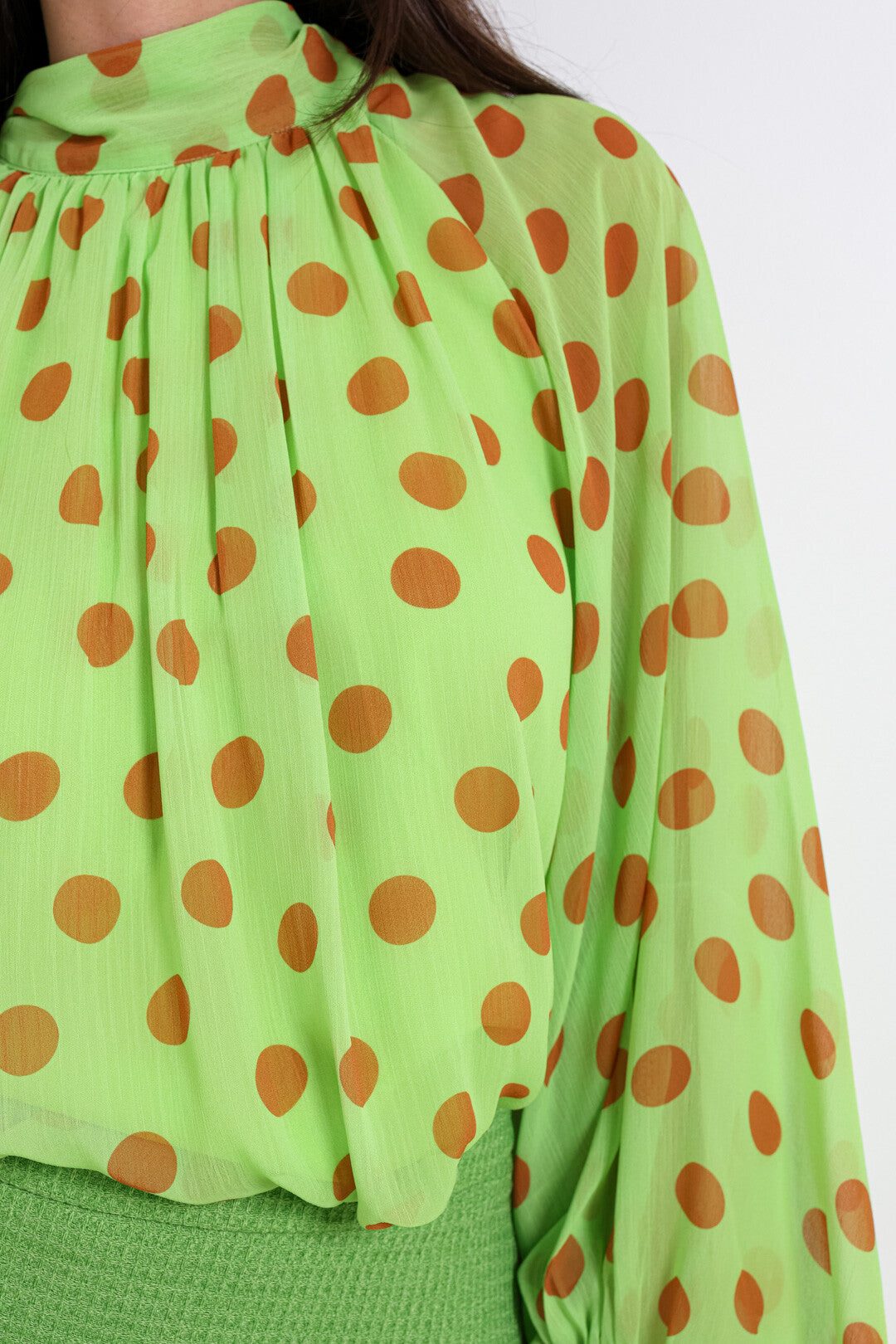 Green polka dot balloon sleeve top