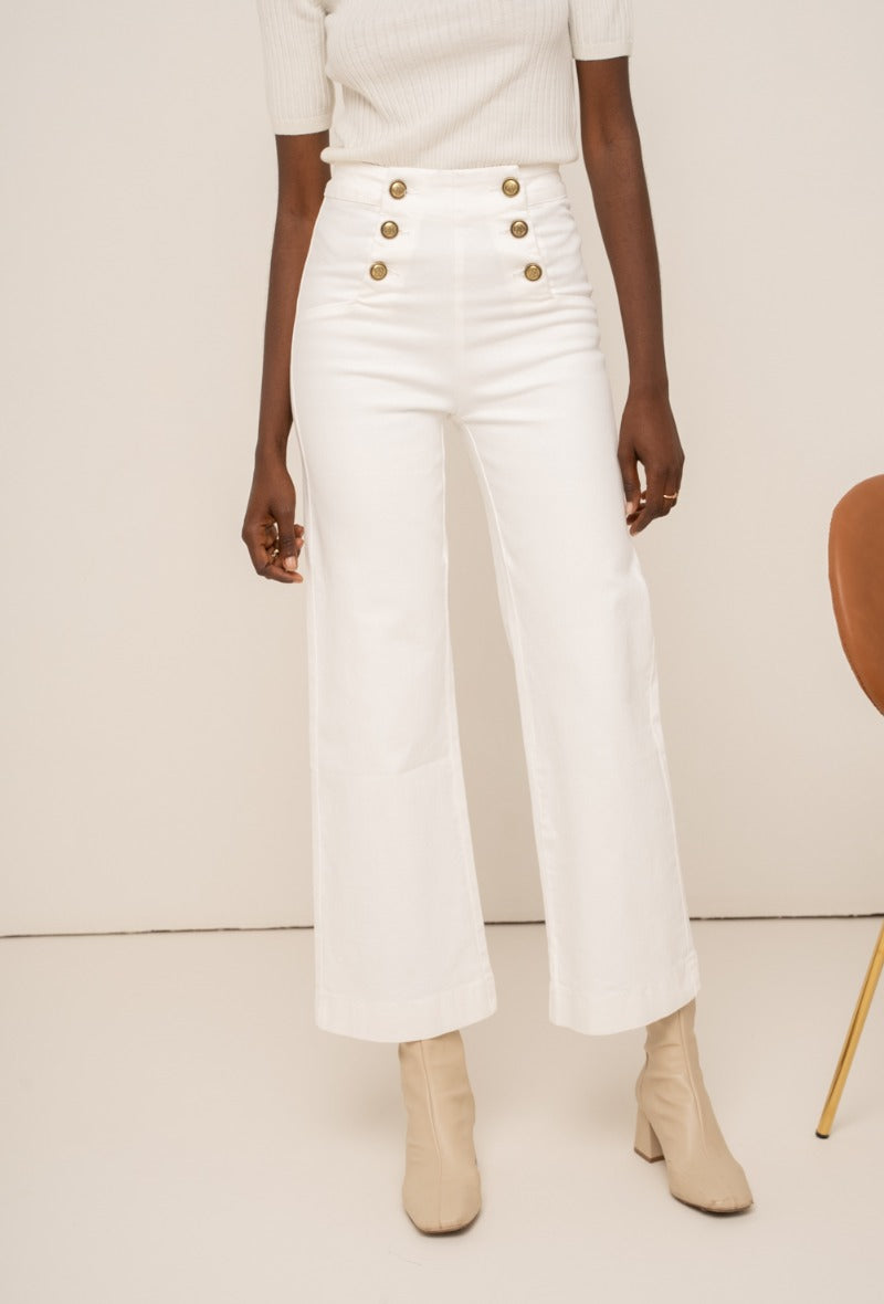 Wide leg white jeans with gold buttons
