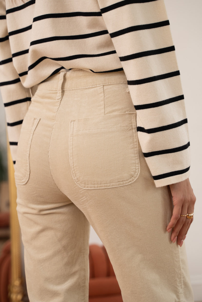 Cream cord jeans with front gold buttons